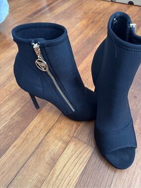 Guess Black Peep-Toe Stiletto Ankle Boots with Gold Logo Zip